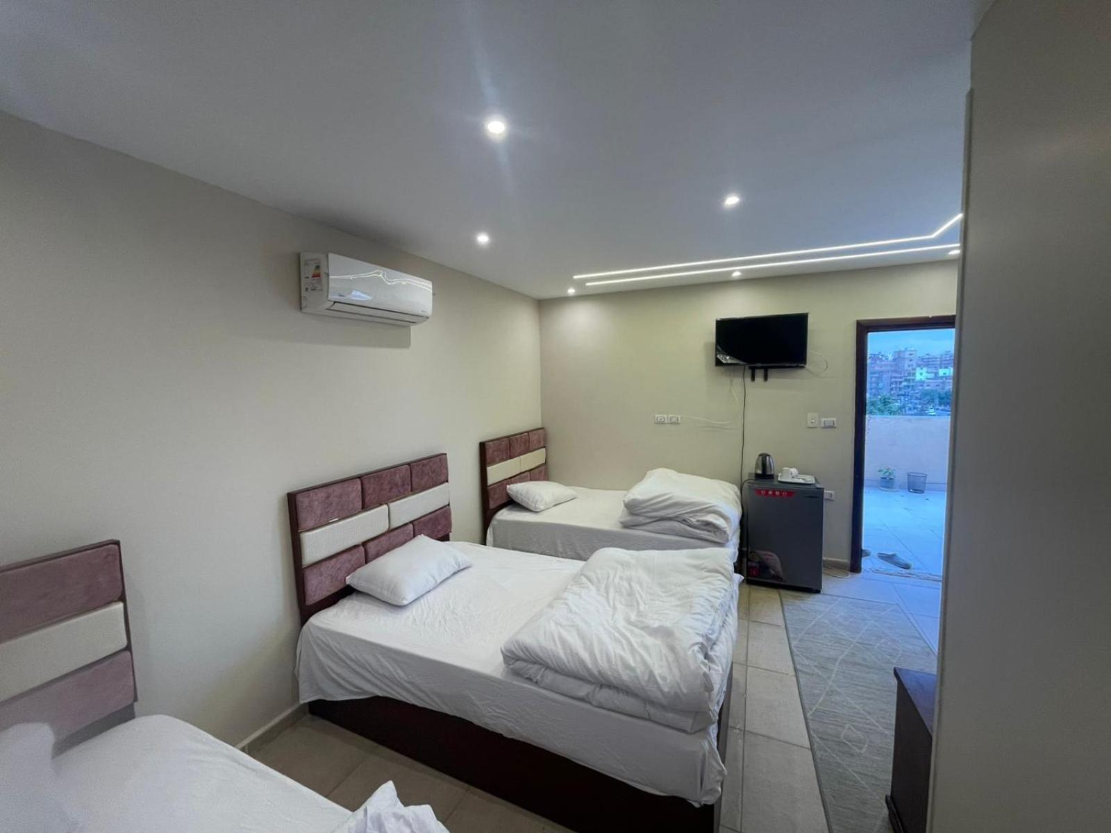 Sami Holiday Inn - Pyramids View Rooftop Al Kawm al Akhdar المظهر الخارجي الصورة